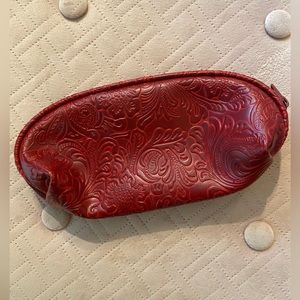 Zippered red engraved floral design soft shell case